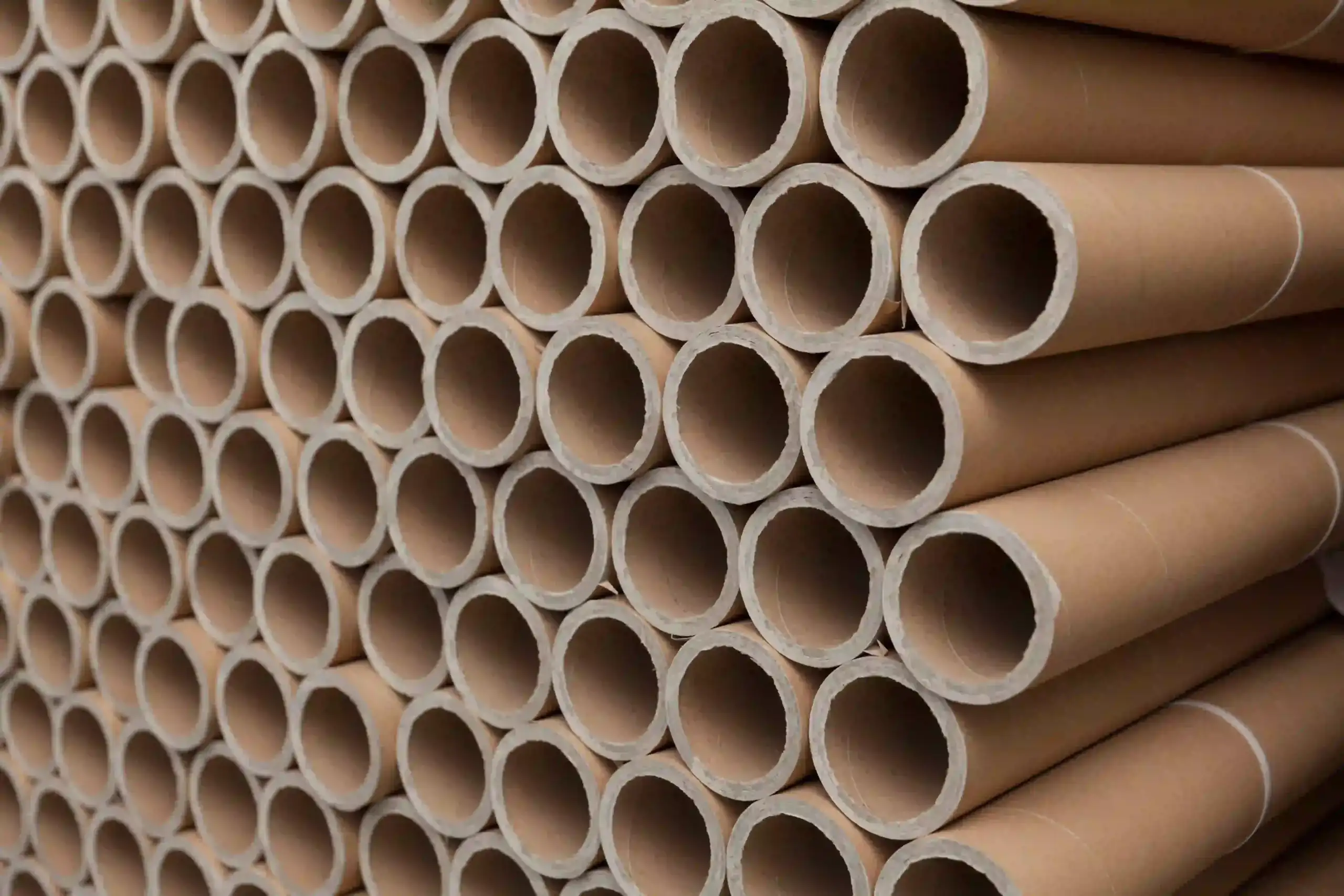 industrial tubes brown stacked tubes industrial tubes brown stacked tubes